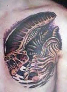 alien-tattoo-on-chest