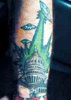 alien-attack-building-tattoo