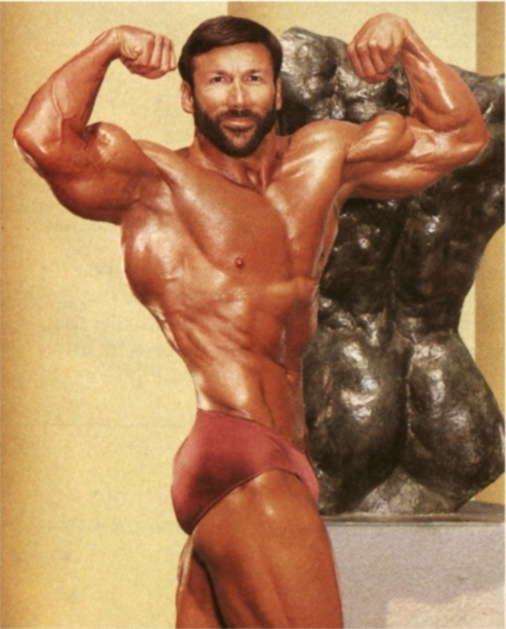 Boyer Coe | BODYBUILDERS IN RED POSING SUITS