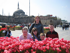 Beautiful family and the flowers are nice to.