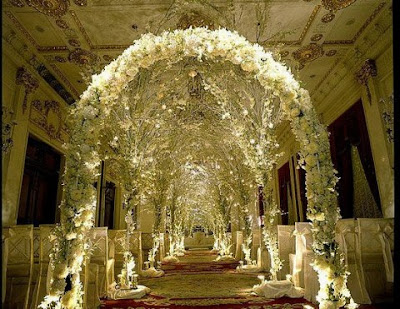 Instead make an arch of decorative fabric flowers vines or for a really Instead make an arch of decorative fabric flowers vines or for a really
