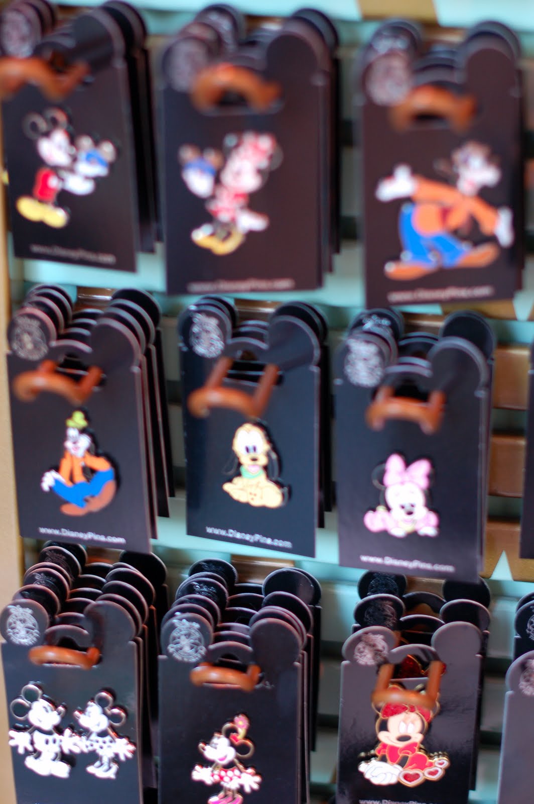 halloween time gifts are offered in disneyland resort shops gifts include jack o lantern mouse ears and collectable pins depicting mickey mouse and his