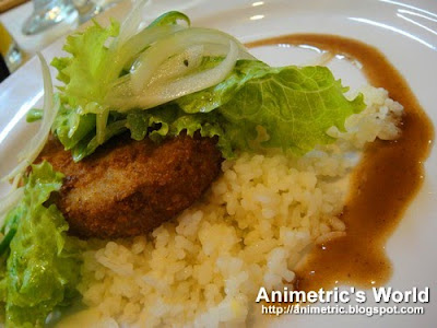Shiraz Braised Pork Knuckles with Watercress Relish in Mashed Potatoes with Port Wine Sauce at AICA The Academy for International Culinary Arts