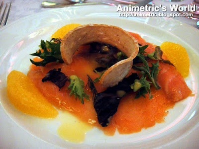 Smoked Citrus scented Atlantic ssalmon with petit mesclun greens and orange mustard dressing at Manila Peninsula