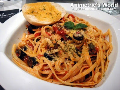 Linguini with Putanesca Sauce and Spicy Tuyo at Romulo Cafe