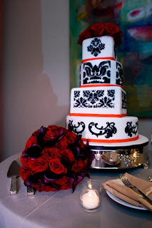 wedding at the westin grand georgetown black vase centerpiece with crystals and red flowers
