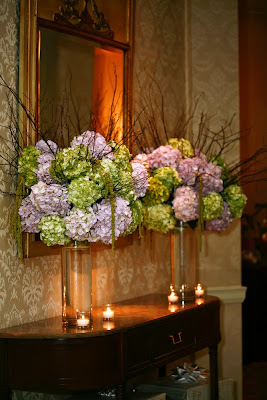 wedding at the fairmont washington dc lighting and flowers hydrangia centerpiece with candles and for the name card table we used branches
