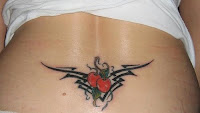 Tatuagem de cerejas com tribal