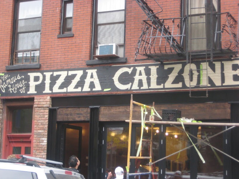Lost City House of Pizza & Calzone Makes Sign By Hand!