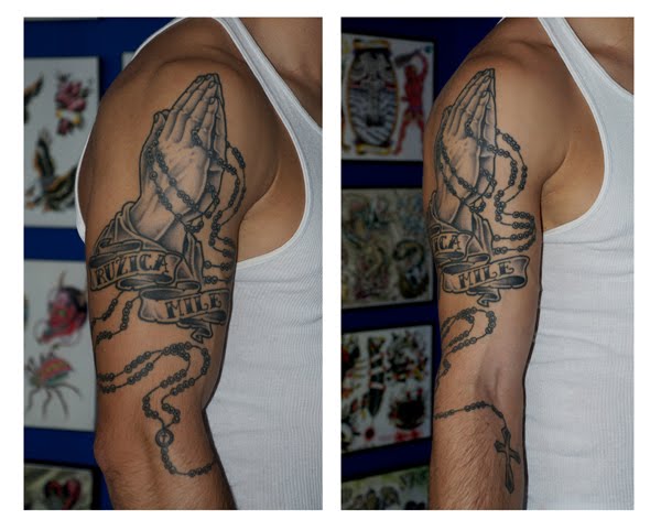 He had the small cross on his forearm and wanted to get some praying hands 