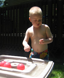 Robbie at the water table