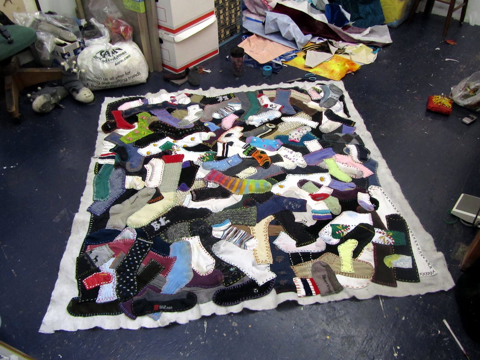Art In Stitches Sock art quilts and Decision Portraits in Greenville