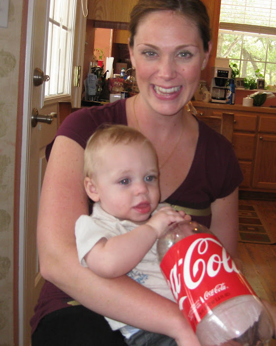 Momma's little man - not quite ready for Coke