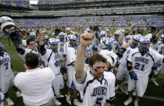 Peter Lamada (#5) and other Duke players salute fans after game Peter Lamada (#5) and other Duke players salute fans after game