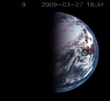 A sun glint on Earth is captured (center of the black circle) A sun glint on Earth is captured (center of the black circle)