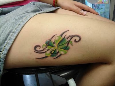 girl with leg flower tattoo