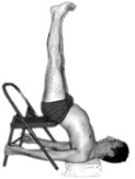 Viparita Karani in Sarvangasana on a Chair--Chair shoulder stand with lifted legs