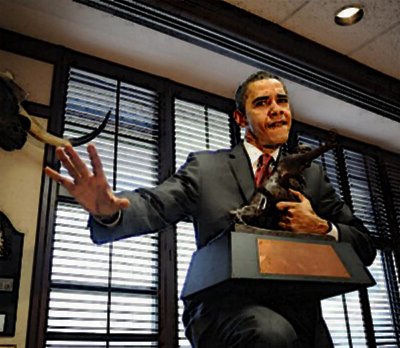 [091014-obama-heisman.jpg]
