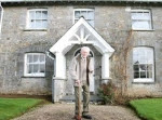 Douglas Mathews standing in front of his house Douglas Mathews standing in front of his house
