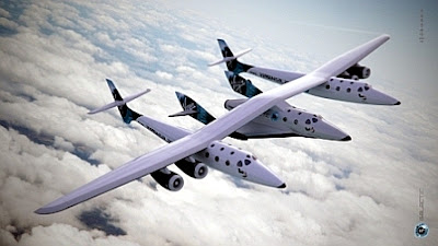SpaceShipTwo is carried between the two fuselages of White Knight II SpaceShipTwo is carried between the two fuselages of White Knight II