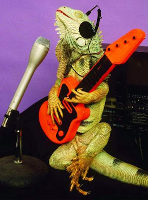 Lizard posing with guitars Lizard posing with guitars