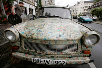 Car covered with thousands of stamps Car covered with thousands of stamps