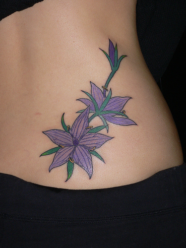 lower back flower tattoos. flowers tattoos black. lower back flower tattoos.