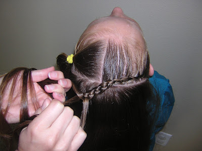  her head for a few plaits. hair style for girls Resume the french braid, 