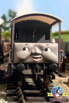Oliver the Great Western Engine and Toad the brakevan in a wheel oil steamworks engine repair yard