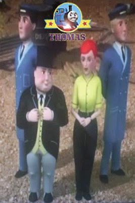 Happy waiting patiently in the Sodor train station is Sir Topham Hatt because Patience is a Virtue