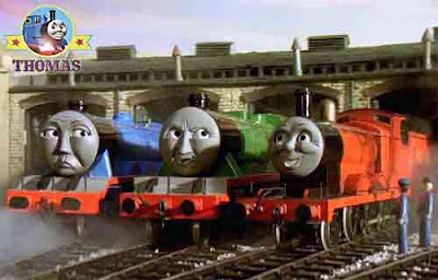 Thomas and friend James the red engine at Tidmouth wooden roundhouse shed with big Gordon locomotive