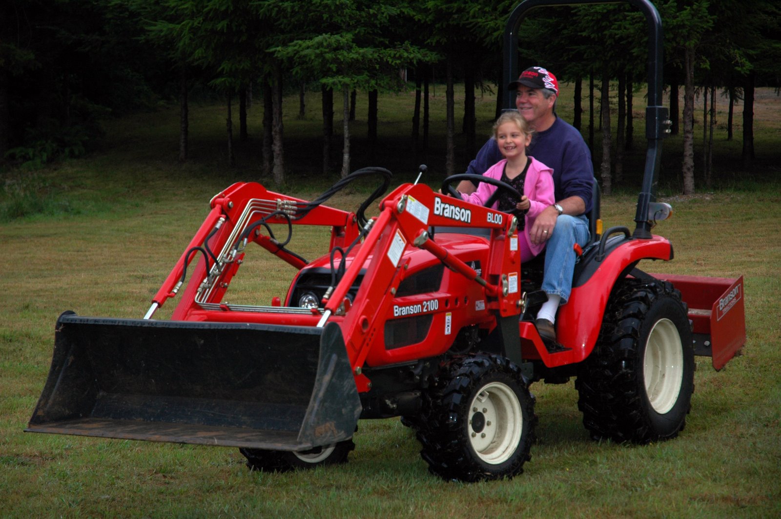[Shannon+and+Roy+on+Tractor.jpg]