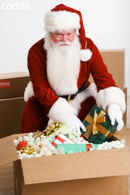 Santa Claus packing the gifts hot pic