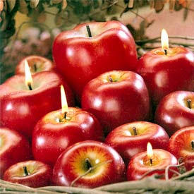 Beautiful realistic apple candles hot photo