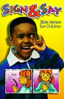 Sign and Say Bible Verses for Children(rhymes) book coverpage with a boy and girl showing God and Love photo