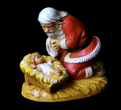 Santa Praying at child Jesus stable(manger) on bowing on his knees(kneeling) free download Christian Christmas pictures