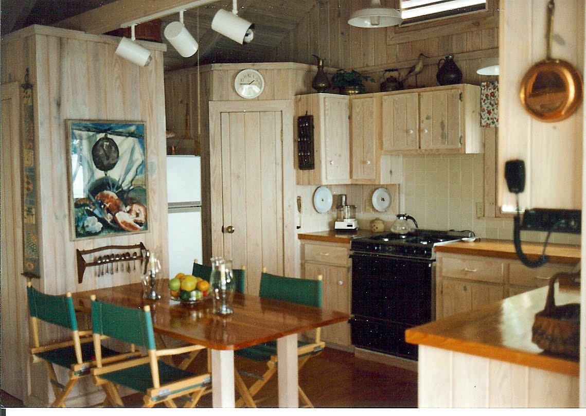 Under kitchen cabinet radio Our island kitchen, small but efficient VHF radio with mike hanging