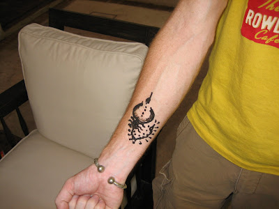 Rowdy's scorpion "Hand of Fatima" tattoo got us some extra customer service