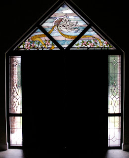 peace dove stained glass entry