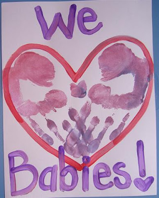 Handprint sign, "We Babies!"