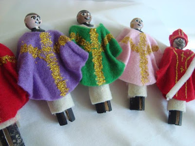 Lineup of finished peg dolls