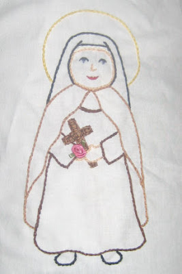 Embroidered outline of St. Therese