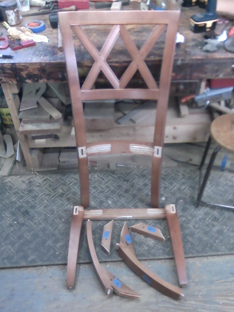 John Mark Power, Antiques Conservator Gluing some loose chairs