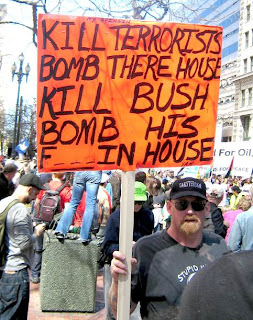 protester with a sign saying Kill Bush and advocating that the White House be bombed, at the March 18 2007 anti-war rally in San Francisco