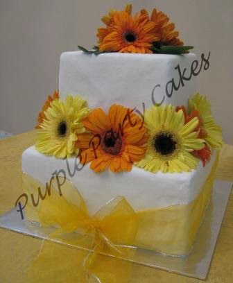 Yellow and Orange Gerbera Wedding Cake wedding cakes in yellow