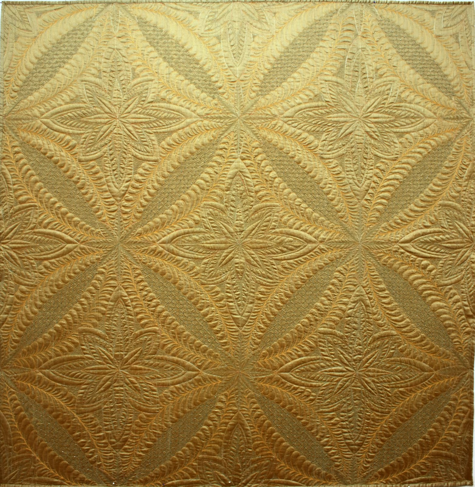 Quilt Inspiration: Delicate Intricacies: The Wholecloth Quilts of Cindy Needham