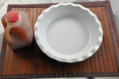 white bowl next to apple cider