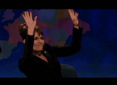 Sarah Palin dancing in her seat to an Alaskan rap song