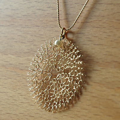 gold flower pendant 