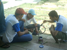 Pintando os aros da tabela de Basquete